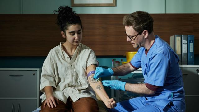 Clinician treating a patient