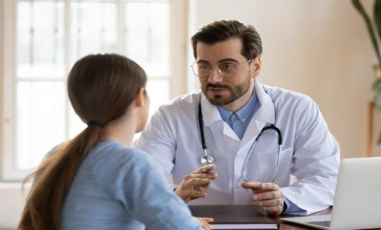 doctor with young woman 
