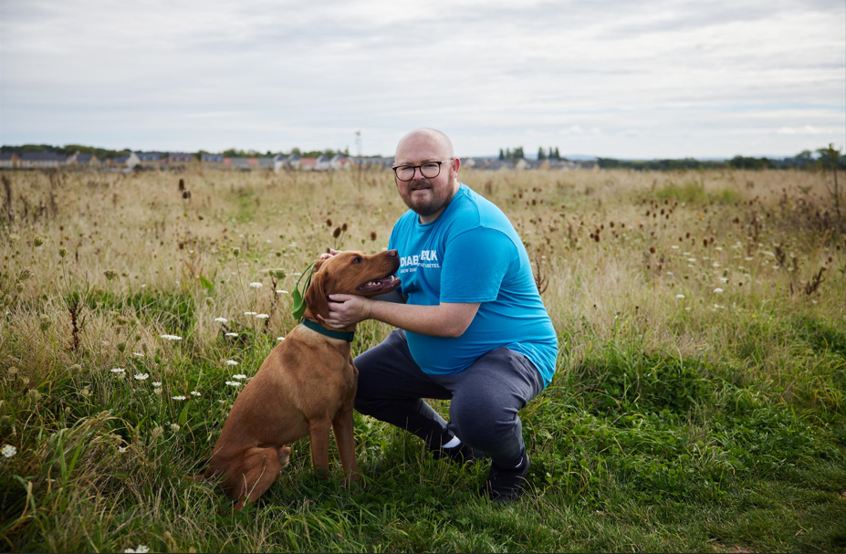 James pictured with his dog